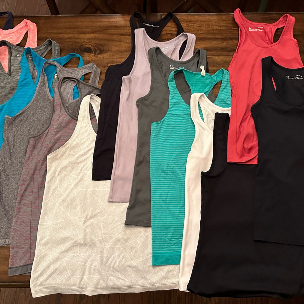 15 Under Armour tank tops - excellent used condition assorted colors and styles